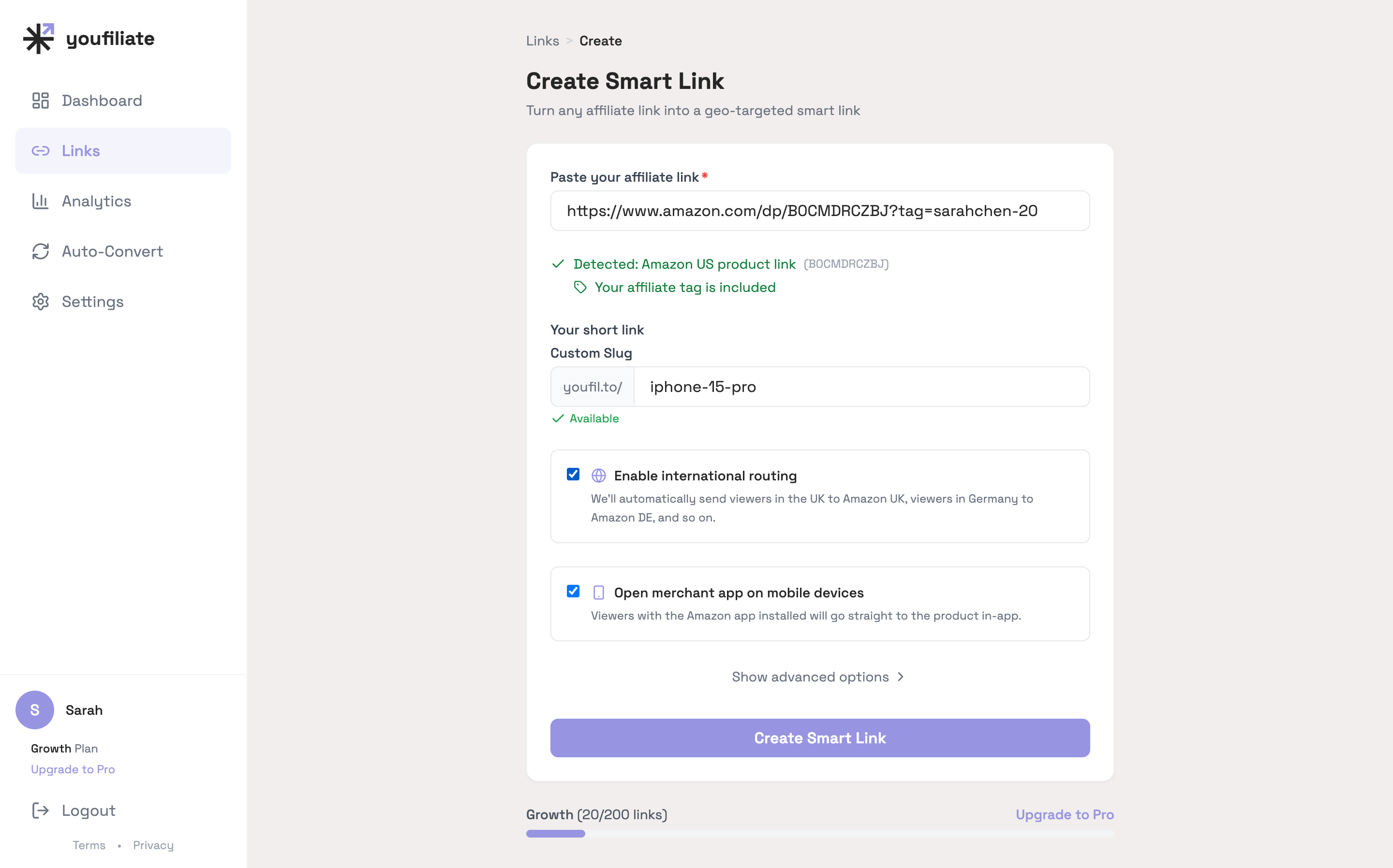 Youfiliate's create-smart-link screen with an Amazon URL pasted in. The ASIN is auto-detected, the affiliate tag is verified, the slug shows youfil.to/iphone-15-pro as Available, and two toggles light up for international routing and merchant-app deep linking